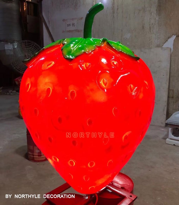 strawberry statue lighting