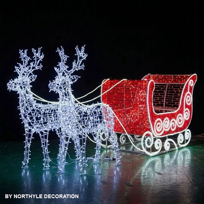 Christmas reindeer and sleigh lights set — two lighted reindeer with sleigh, designed for shopping mall entrances, city plazas and outdoor festival displays width=