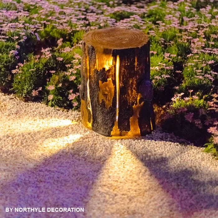 luminous tree stump light — lantern at night