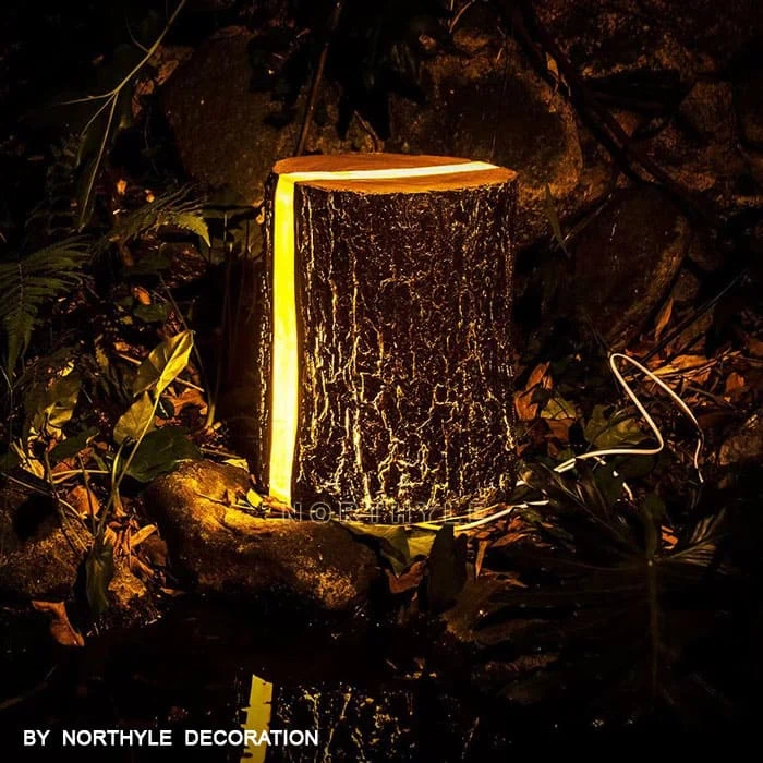 luminous tree stump lamp at night