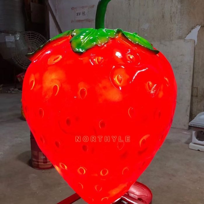 strawberry statue lighting
